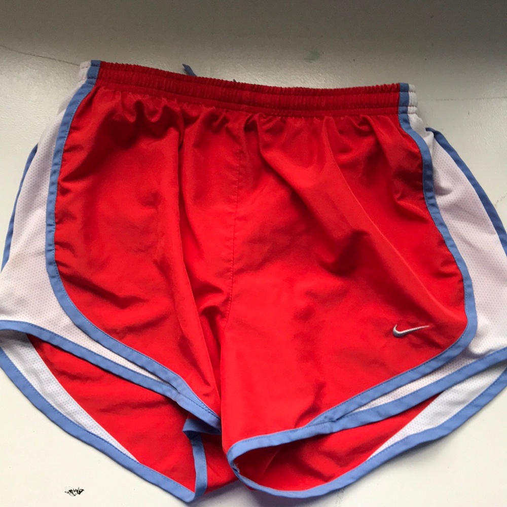 Red Nike running shorts